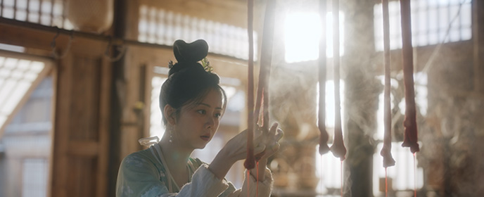 糸を染める季英英